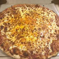 A large, round Rig A' Tony's cheese pizza with a golden-brown crust, fresh from the oven.